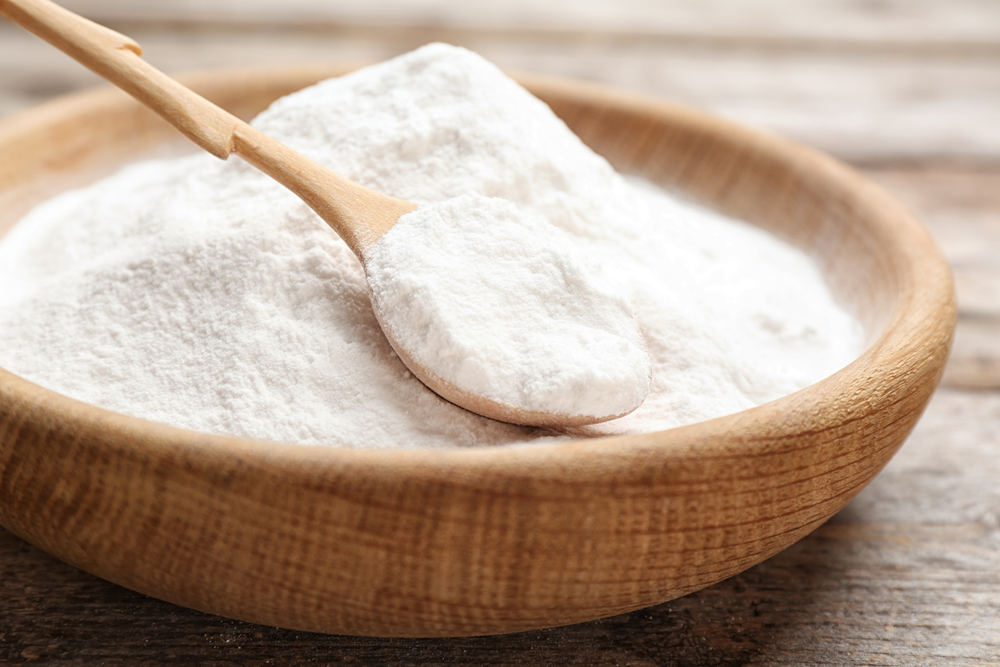 baking soda on wooden table